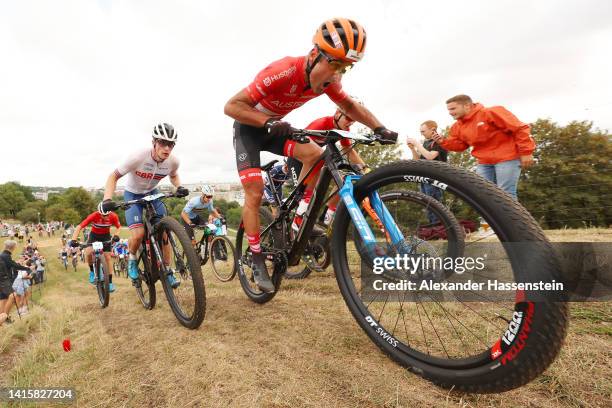 Karl Markt of Austria and Cameron Orr of Great Britain compete in the Men's Cross-Country during the cycling Mountain Bike competition on day 9 of...