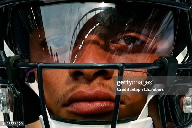 Justin Fields of the Chicago Bears looks on before taking the field during the preseason game between the Seattle Seahawks and the Chicago Bears at...