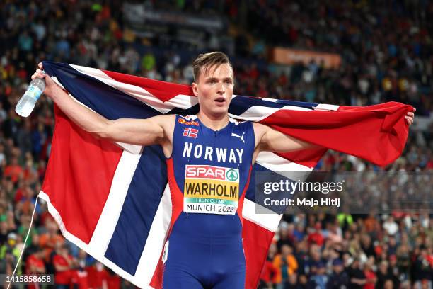 Gold medalist Karsten Warholm of Norway celebrates after the Athletics - Men's 400m Hurdles Final on day 9 of the European Championships Munich 2022...