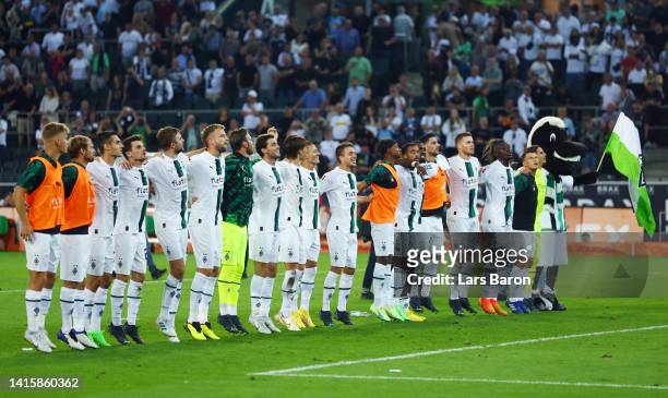 Players of Moenchengladbach celebrate after the Bundesliga match between Borussia Mönchengladbach and Hertha BSC at Borussia-Park on August 19, 2022...