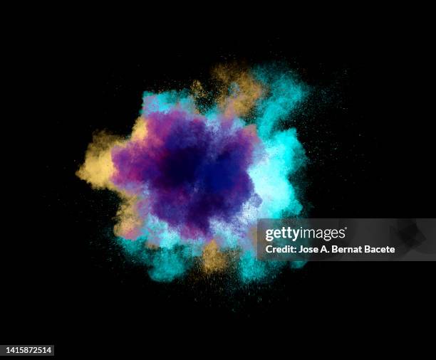 explosion and blast wave of multicolored dust and smoke on a black background. - spark creativity stock pictures, royalty-free photos & images