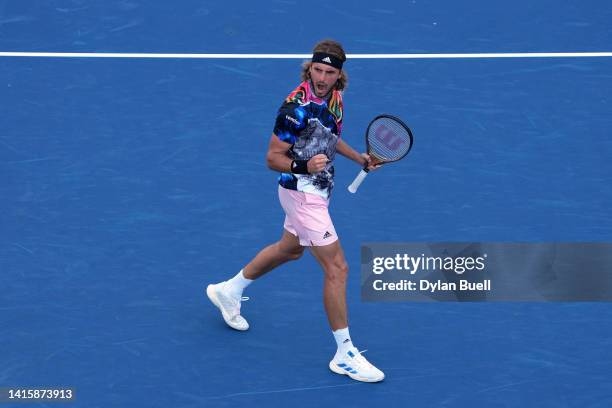 Stefanos Tsitsipas of Greece celebrates after defeating John Isner of the United States in their Men's Singles Quarterfinal match on day seven of the...