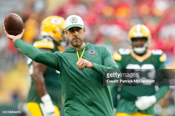 Aaron Rodgers of the Green Bay Packers throws a pass before a preseason game against the New Orleans Saints at Lambeau Field on August 19, 2022 in...