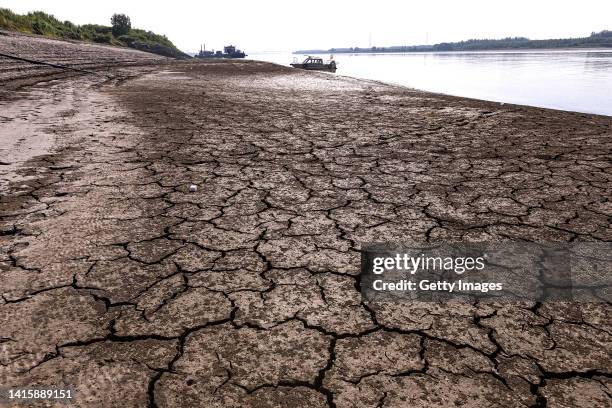 Cracked silt on the bank of the Yangtze River is seen on August 19, 2022 in Wuhan, Hubei Province, China. According to the news conference of the...