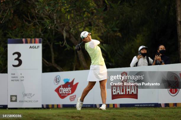 Hinako Shibuno of Japan hits her tee shot on the 3rd hole during day three of the Simone Asia Pacific Cup at Pondok Indah Golf Course on August 20,...