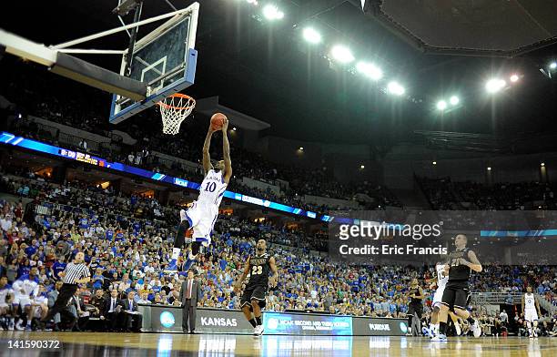 Tyshawn Taylor of the Kansas Jayhawks dunks in the second half against the Purdue Boilermakers during the third round of the 2012 NCAA Men's...