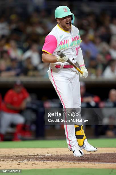 Brandon Drury of the San Diego Padres reacts after striking out during the fifth inning of a game against the Washington Nationals at PETCO Park on...