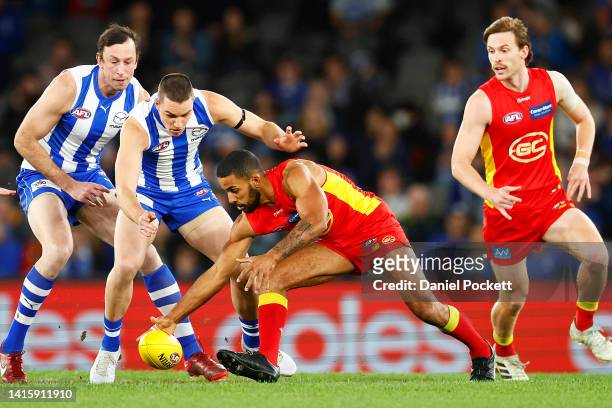 Touk Miller of the Suns in action during the round 23 AFL match between the North Melbourne Kangaroos and the Gold Coast Suns at Marvel Stadium on...