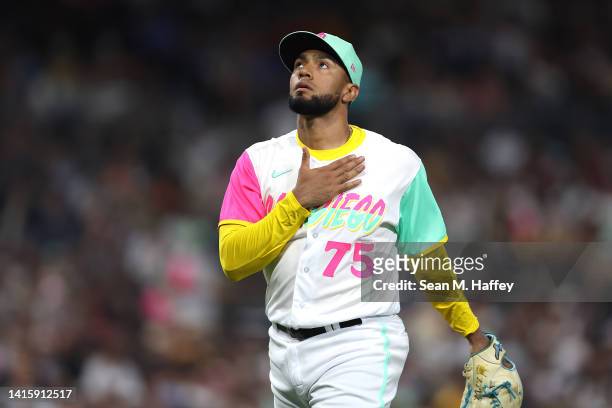Robert Suarez of the San Diego Padres looks on during the seventh inning of a game against the Washington Nationals at PETCO Park on August 19, 2022...