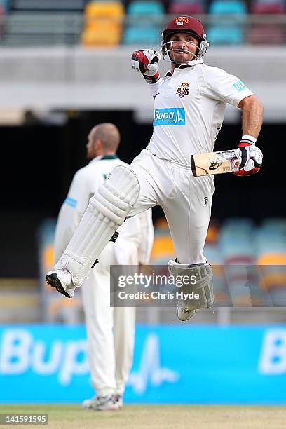 Chris Hartley of the Bulls celebrates winning the Sheffield Shield match between the Queensland Bulls and the Tasmania Tigers at The Gabba on March...