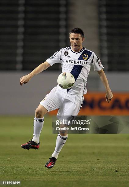 Robbie Keane of the Los Angeles Galaxy controls the ball against Toronto FC during a CONCACAF Champions League game at The Home Depot Center on March...
