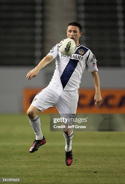 Robbie Keane of the Los Angeles Galaxy controls the ball against Toronto FC during a CONCACAF Champions League game at The Home Depot Center on March...