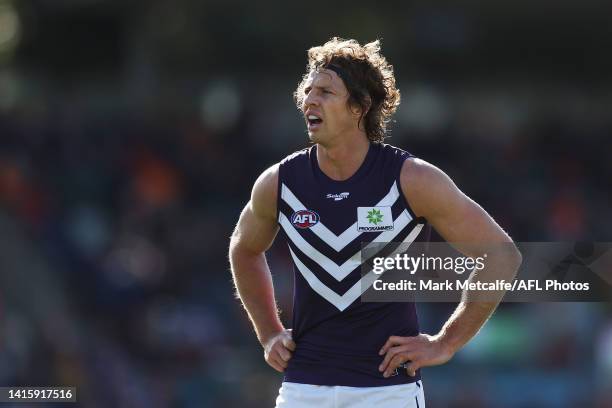 Nat Fyfe of the Dockers looks on during the round 23 AFL match between the Greater Western Sydney Giants and the Fremantle Dockers at Manuka Oval on...