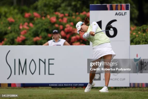 Hinako Shibuno of Japan hits her tee shot on the 16th hole during day three of the Simone Asia Pacific Cup at Pondok Indah Golf Course on August 20,...