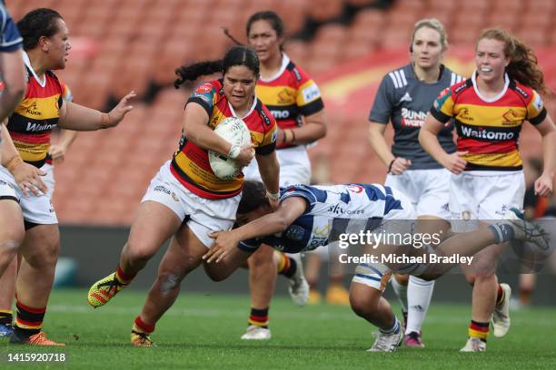 Merania Paraone of Waikato is tackled during the round six Farah Palmer Cup match between Waikato and Auckland at FMG Stadium Waikato, on August 20...