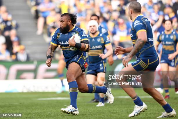 Junior Paulo of the Eels runs the ball during the round 23 NRL match between the Parramatta Eels and the Canterbury Bulldogs at CommBank Stadium on...