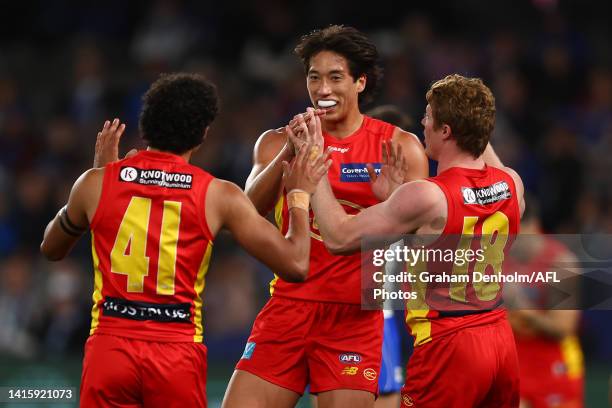 Alex Davies of the Suns celebrates kicking a goal during the round 23 AFL match between the North Melbourne Kangaroos and the Gold Coast Suns at...