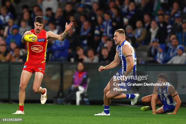 Alex Sexton of the Suns kicks at goal during the round 23 AFL match between the North Melbourne Kangaroos and the Gold Coast Suns at Marvel Stadium...