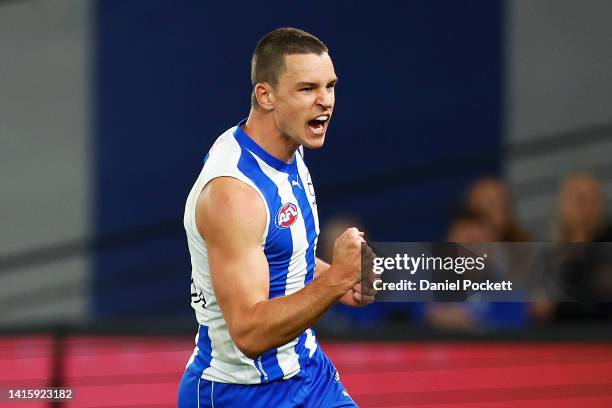 Luke Davies-Uniacke of the Kangaroos celebrates kicking a goal during the round 23 AFL match between the North Melbourne Kangaroos and the Gold Coast...