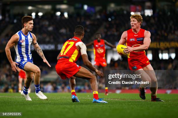 Matt Rowell of the Suns looks to pass the ball during the round 23 AFL match between the North Melbourne Kangaroos and the Gold Coast Suns at Marvel...