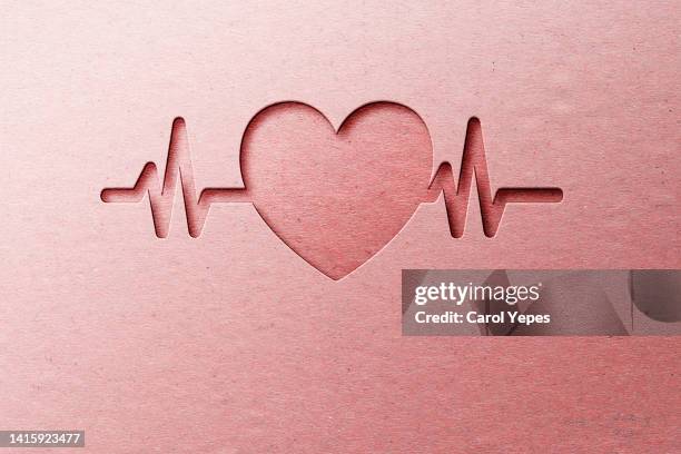red paper heart and ekg in paper cut style - taking pulse bildbanksfoton och bilder