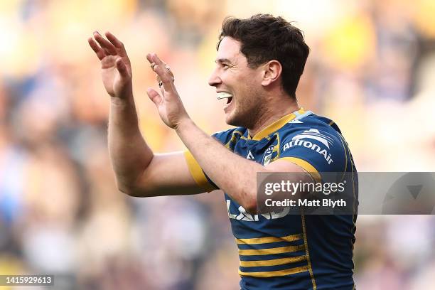 Mitchell Moses of the Eels celebrates the try scored by Ryan Matterson during the round 23 NRL match between the Parramatta Eels and the Canterbury...