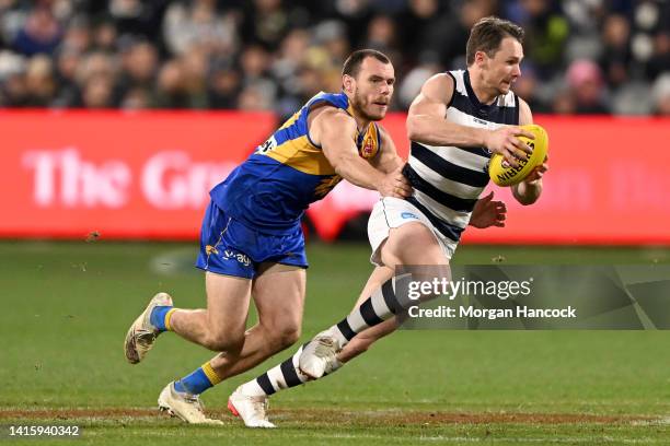 Patrick Dangerfield of the Cats takes possession of the ball during the round 23 AFL match between the Geelong Cats and the West Coast Eagles at...