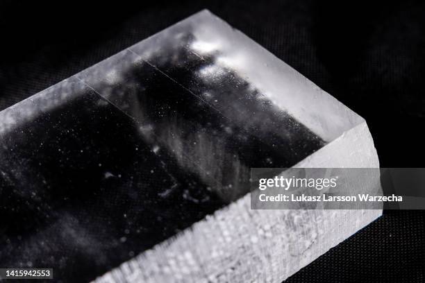 An ice slab cleaned with a microtome knife is ready for the line scanner, which records the visual layers in the core. Even with a naked eye, cloudy...