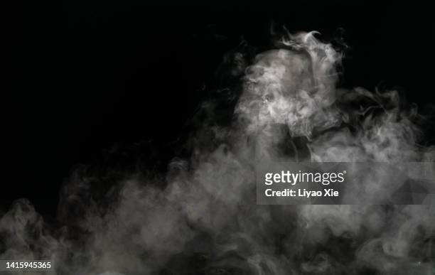dry ice evaporation fog - smoke physical structure stock-fotos und bilder