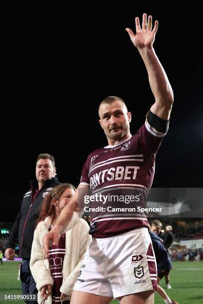 Kieran Foran of the Sea Eagles walks a lap of honour after playing his final home game for the Sea Eagles following the round 23 NRL match between...