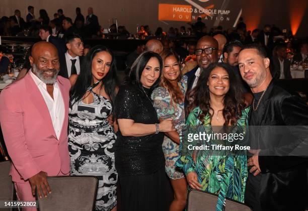 Mike Tyson, Kiki Tyson, a guest, Alicia Etheredge-Brown, Bobby Brown, and guests attend the 22nd Annual Harold and Carole Pump Foundation Gala at The...