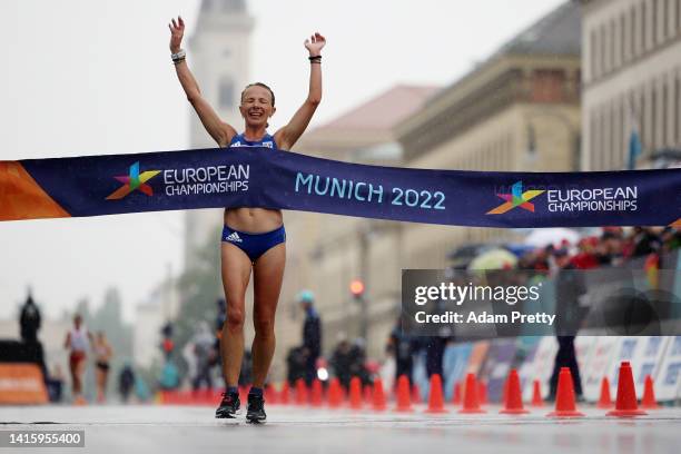 Gold medalist Antigoni Ntrismpioti of Greece celebrates while crossing the finish line during the Women's 20km Race Walk Final on day 10 of the...