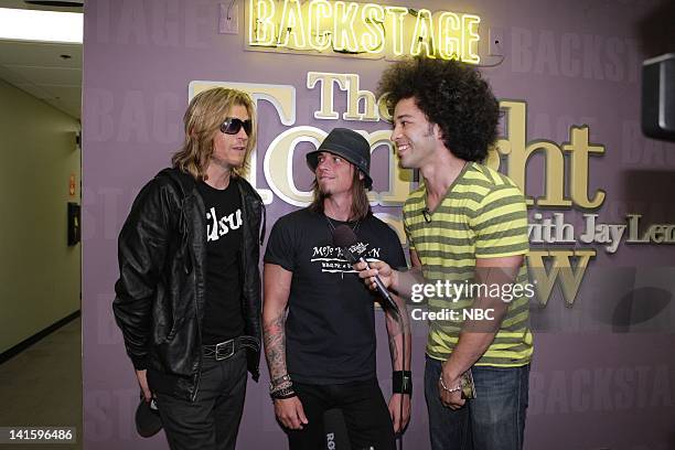 Episode 4125 -- Pictured: Wesley Scantlin and Paul Phillips of musical guest Puddle of Mudd during an interview with Bryan Branly backstage on...