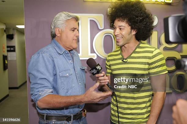 Episode 4107 -- Pictured: Host Jay Leno talks with Brian Branley backstage on September 12, 2011 -- Photo by: Paul Drinkwater/NBC/NBCU Photo Bank