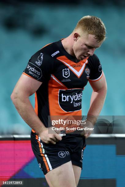 Alex Seyfarth of the Tigers reacts to a Roosters try during the round 23 NRL match between the Sydney Roosters and the Wests Tigers at Sydney Cricket...