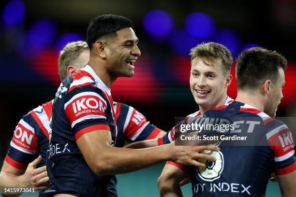 Daniel Tupou of the Roosters during Celebrates with teammates the round 23 NRL match between the Sydney Roosters and the Wests Tigers at Sydney...