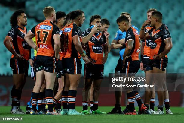 West Tigers Players following a Roosters try during the round 23 NRL match between the Sydney Roosters and the Wests Tigers at Sydney Cricket Ground,...