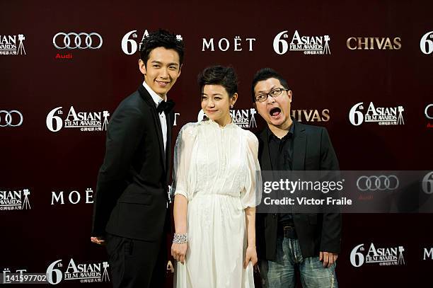Taiwan actors Ko Chen-tung , Michelle Chen and Taiwanese director Giddens Ko pose backstage during attends the 6th Asian Film Awards, celebrating...