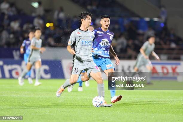 Kaito SUZUKI of Tochigi SC and Hayate TAKE of Blaublitz Akita battle for the ball during the J.LEAGUE Meiji Yasuda J2 32nd Sec. Match between...