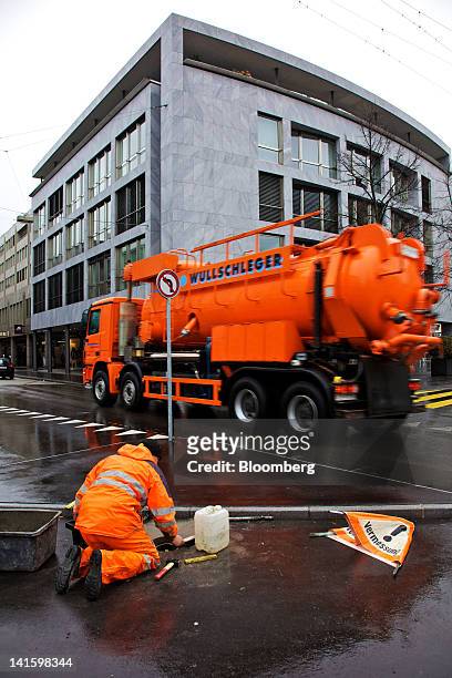 Truck passes the building that houses the headquarters of Xstrata Plc in Zug, Switzerland, on Monday, March 19, 2012. Glencore International Plc...