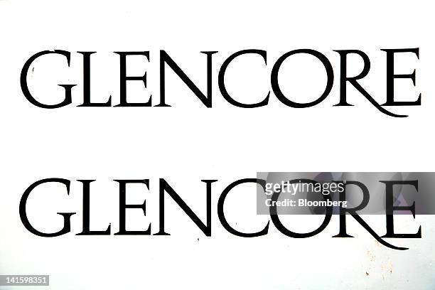 The logo of Glencore International Plc is displayed outside the company's headquarters in Baar, Switzerland, on Monday, March 19, 2012. Glencore...