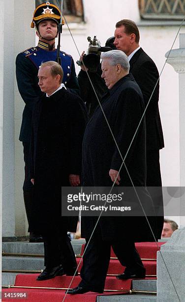 Russian President Vladimir Putin, left, and former President Boris Yeltsin attend an inauguration ceremony for Putin May 7, 2000 in the Kremlin in...
