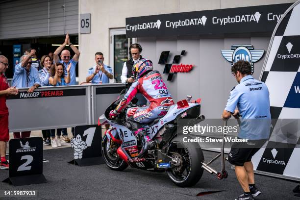 Enea Bastianini of Italy and Gresini Racing MotoGP enters parc ferme after he won the pole position during the qualifying practice of the CryptoDATA...