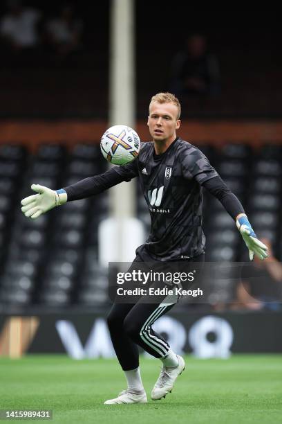 Marek Rodak of Fulham warms up prior to the Premier League match between Fulham FC and Brentford FC at Craven Cottage on August 20, 2022 in London,...