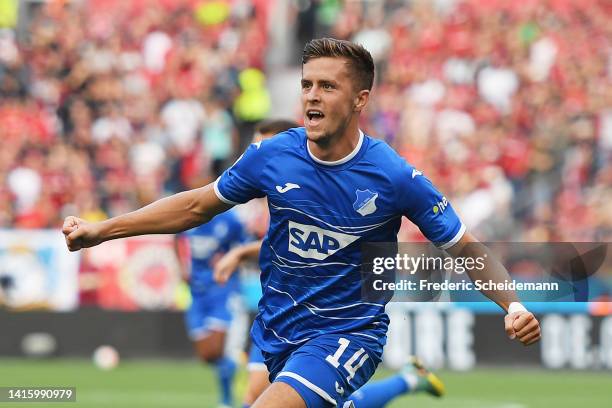 Christoph Baumgartner of Hoffenheim celebrates after scoring their team's first goal during the Bundesliga match between Bayer 04 Leverkusen and TSG...