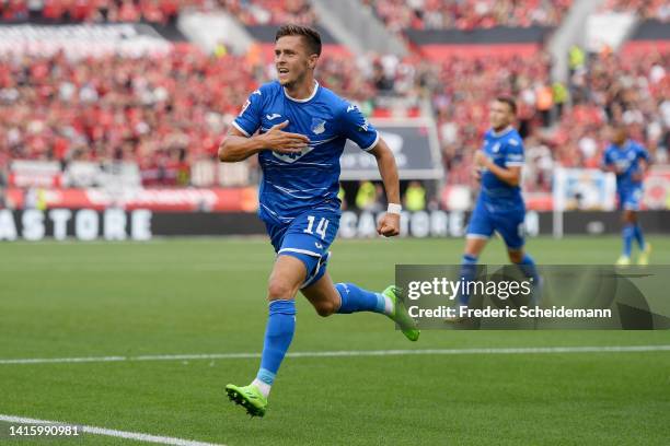 Christoph Baumgartner of Hoffenheim celebrates after scoring their team's first goal during the Bundesliga match between Bayer 04 Leverkusen and TSG...