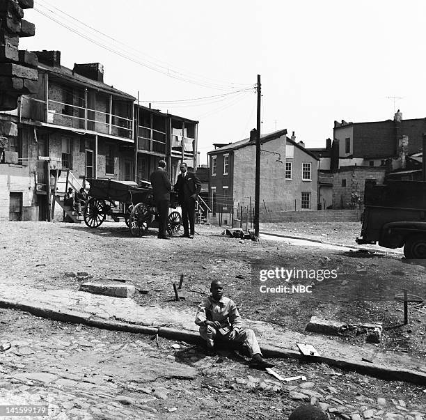 Pictured: NBC News' Sander Vanocur, Floyd McKissick leader of CORE, the Congress of Racial Equality, in a black ghetto in Baltimore, Maryland during...