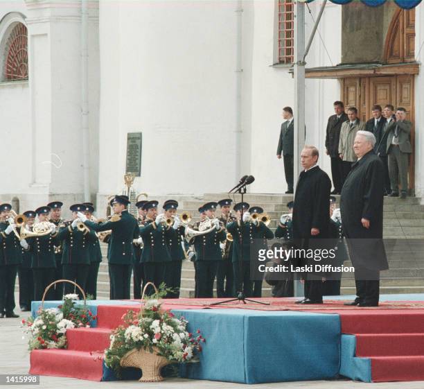 Russian President Vladimir Putin, left, and former President Boris Yeltsin attend an inauguration ceremony for Putin May 7, 2000 in the Kremlin in...