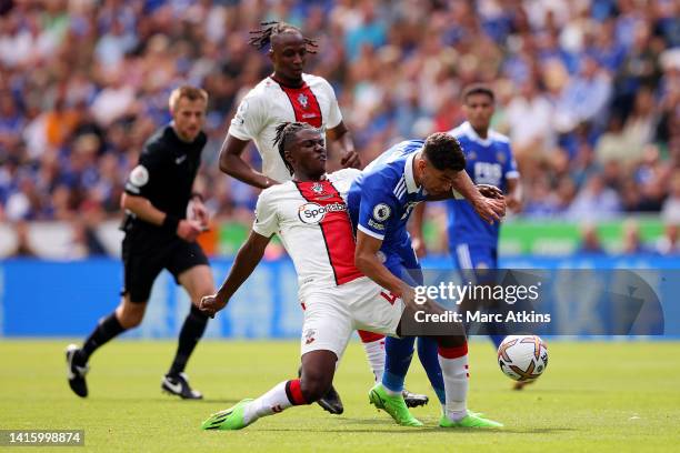 Ayoze Perez of Leicester City is challenged by Romeo Lavia of Southampton during the Premier League match between Leicester City and Southampton FC...