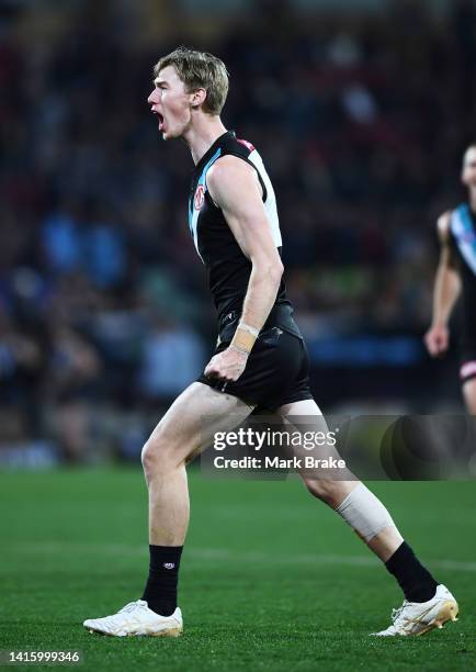 Todd Marshall of Port Adelaide celebrates a goal during the round 23 AFL match between the Port Adelaide Power and the Adelaide Crows at Adelaide...